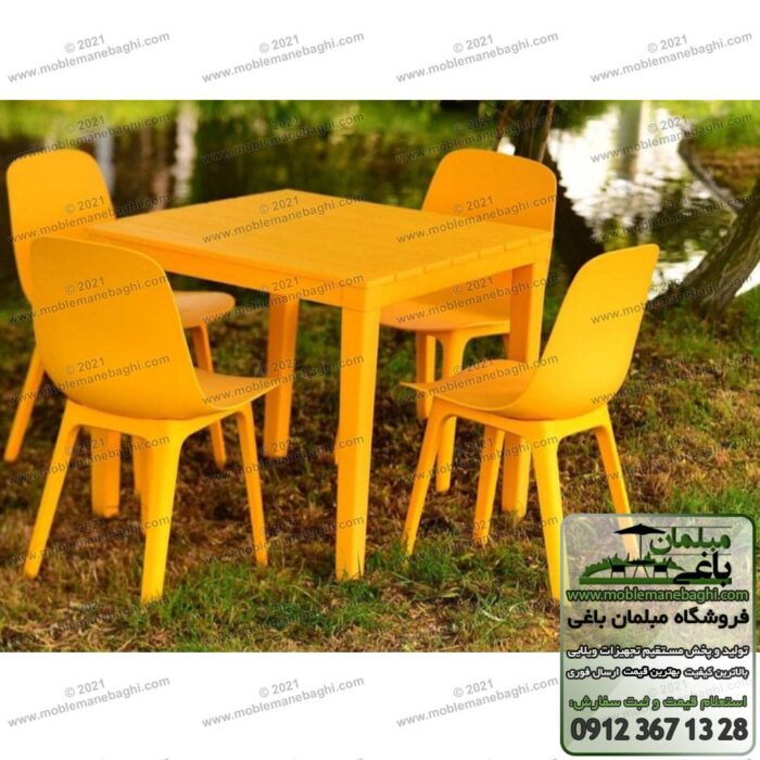 ست میز نهارخوری و صندلی پلیمری مدل تیکا مخصوص فضای باز رنگ زرد بر روی چمن کنار برکه مصنوعی یک ویلای زیبا