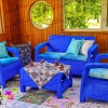 ست چهارنفره مبل حصیری پلیمری مخصوص باغ و باغچه و تراس به رنگ آبی در تراس آلاچیقی زیبا به همراه میز چای خوری حصیری